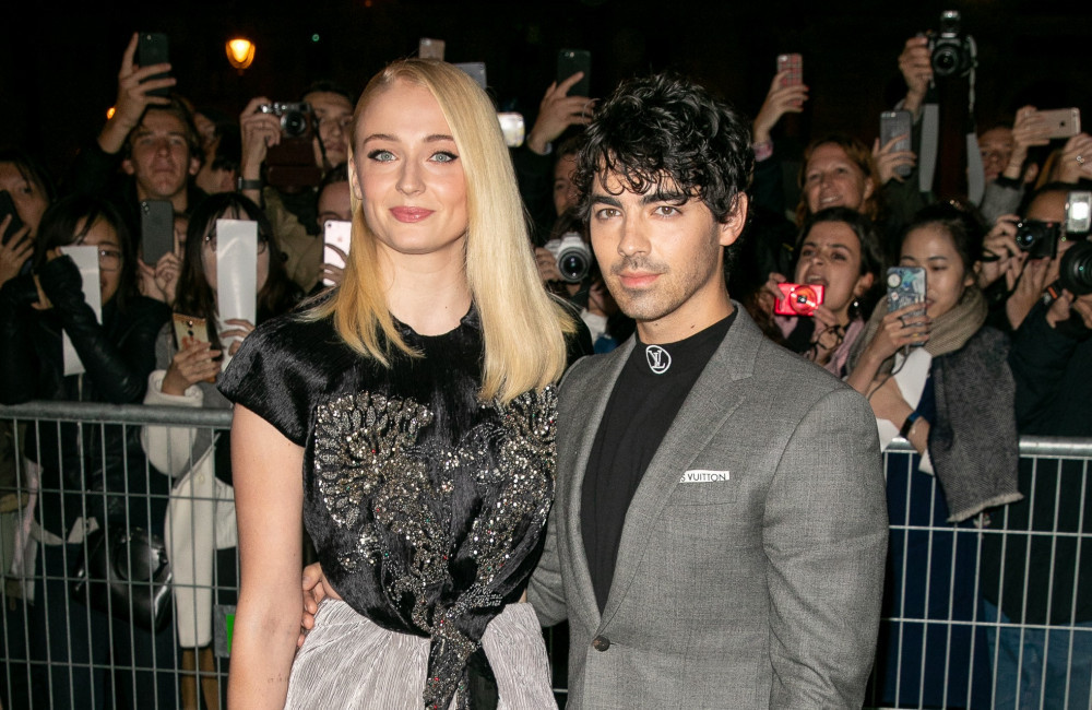 Sophie Turner and Joe Jonas - 2018 Paris Fashion Week - Getty