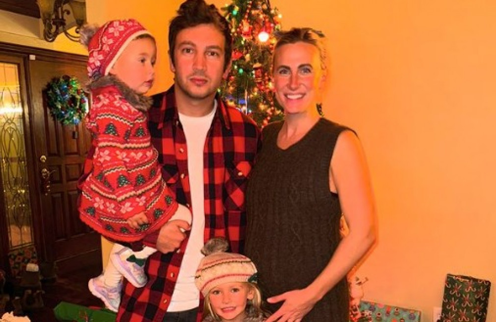 Tyler and Jenna Joseph with two daughters – Instagram December 2023 Tyler and Jenna Joseph with two daughters - Instagram December 2023