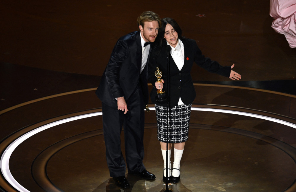 Billie Eilish and Finneas O'Connell accept the award for Best Original Song 96th Oscars - Getty