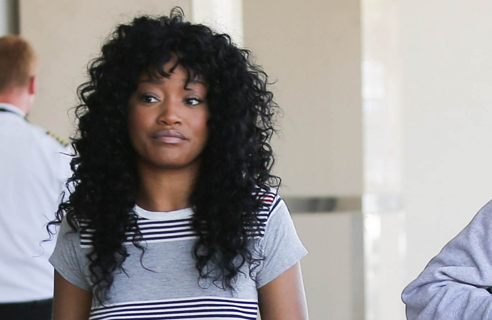 Keke Palmer -August 2015 - natural curly hair - LAX - California - Getty