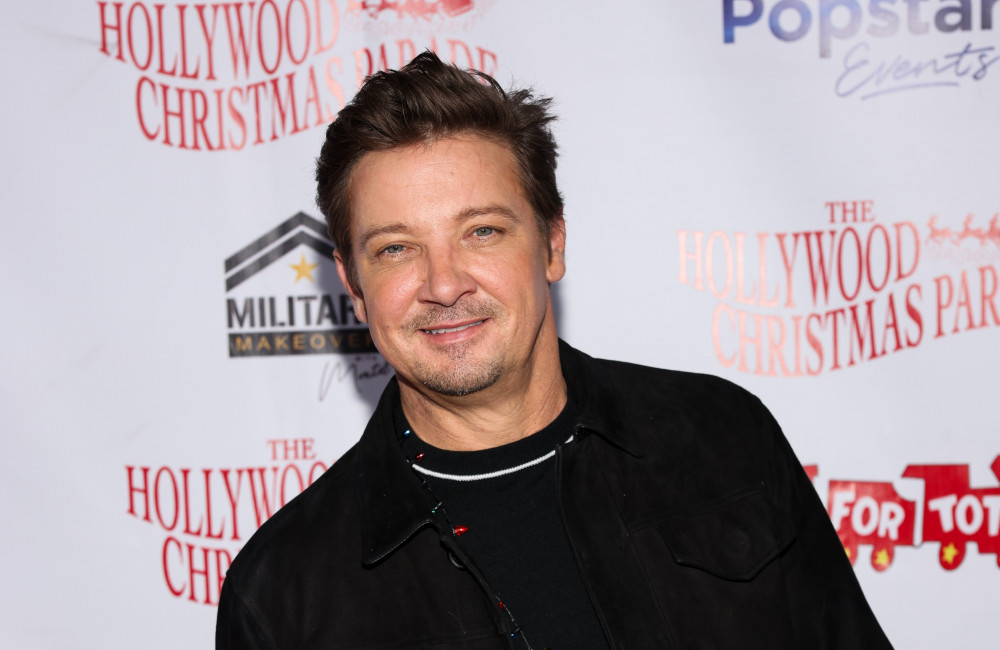 Jeremy Renner attends the 92nd anniversary of The Hollywood Christmas Parade - Getty