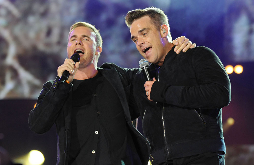 Gary Barlow and Robbie Williams perform Shame - Twickenham - 2010 - photoshot