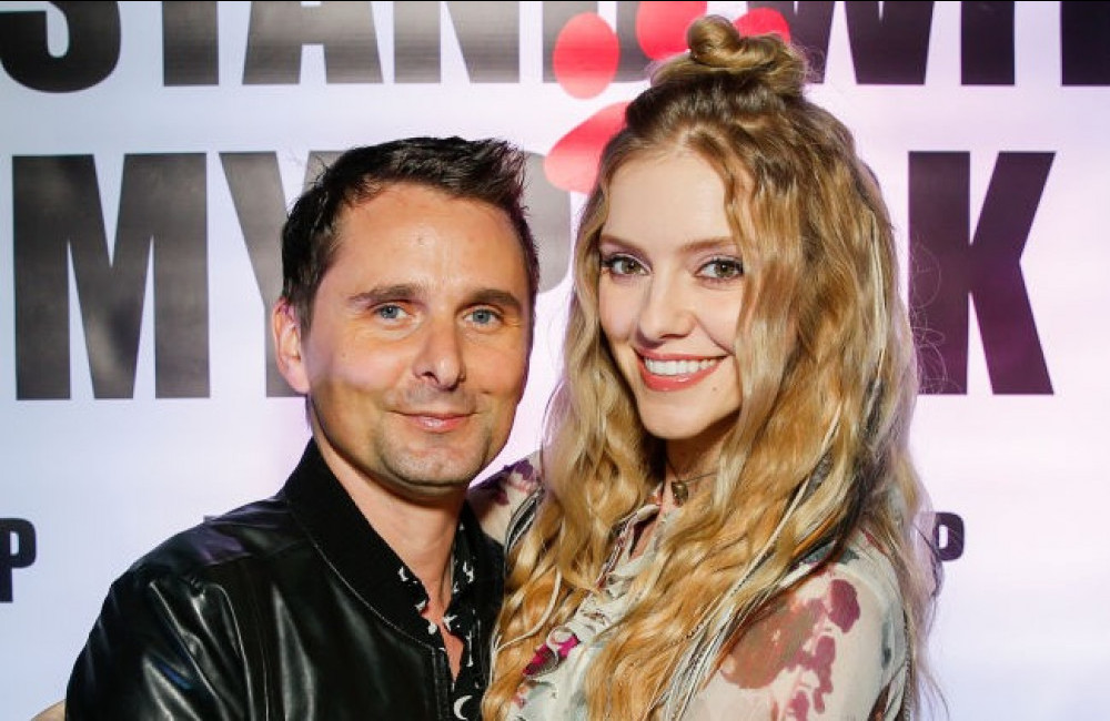 Matt Bellamy and Elle Evans attend the I STAND WITH MY PACK Nov 2019 - Getty