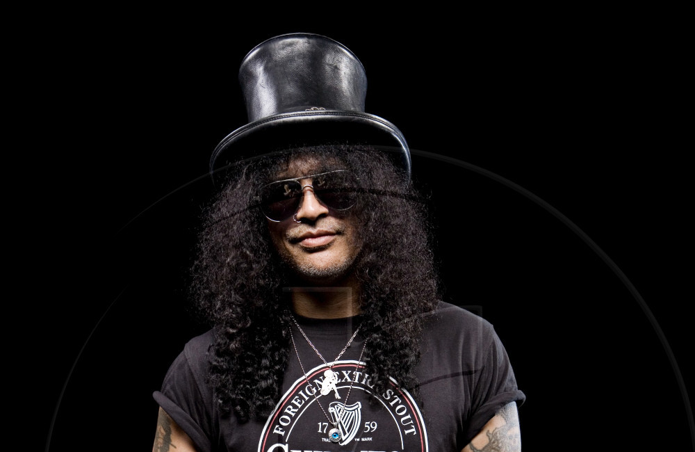 Portrait of Slash and photographed in Manchester